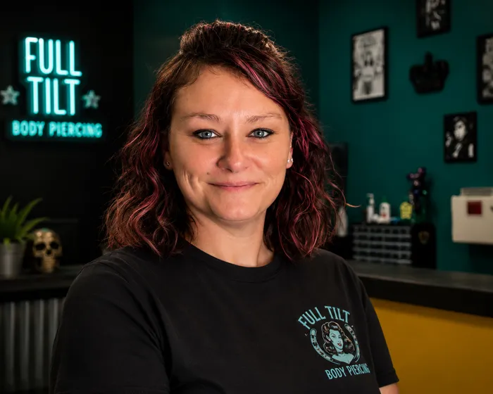 Jenny Gunn, owner and piercer at Full Tilt Body Piercing, inside the studio
